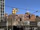 Street view of the Ponce City Market building with historic brickwork and a U.S. flag at 586 Glen Iris Ne Dr, Atlanta, GA 30308