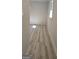 Bedroom featuring modern baseboards, trim and wood-look floors at 3189 Fern Ridge Ne Dr, Conyers, GA 30013