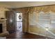 Inviting living room with a decorative fireplace and natural light streaming through the windows at 2019 Se Thomasville Se Dr, Atlanta, GA 30315