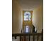 Grand foyer with high ceilings, a chandelier, and a large window allowing for ample natural light at 7354 Spoleto Loop, Fairburn, GA 30213
