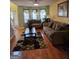 Bright living room with hardwood floors, stylish rug, and comfortable sofas at 7354 Spoleto Loop, Fairburn, GA 30213