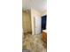Bathroom featuring tile floors and a door to the bedroom at 194 Goldleaf Dr, Hampton, GA 30228