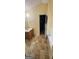 This bathroom features a vanity with a sink, a bathtub, and a walk-in closet for ample storage at 194 Goldleaf Dr, Hampton, GA 30228