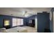 Well-lit bedroom boasts a ceiling fan, a window, and a cozy atmosphere at 194 Goldleaf Dr, Hampton, GA 30228