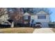 Charming two-story home with brick and siding, front lawn and attached garage at 194 Goldleaf Dr, Hampton, GA 30228