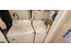 Laundry room equipped with Amana washer and dryer units at 194 Goldleaf Dr, Hampton, GA 30228