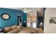 Open living area with staircase and view of adjacent room at 194 Goldleaf Dr, Hampton, GA 30228
