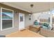 Relaxing back patio featuring outdoor furniture, a ceiling fan, and a sliding glass door at 814 Parker Pass, Peachtree City, GA 30269