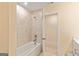 Clean bathroom with tiled shower, bathtub, and neutral walls at 814 Parker Pass, Peachtree City, GA 30269
