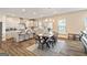 Open concept kitchen with stainless appliances and kitchen island at 814 Parker Pass, Peachtree City, GA 30269