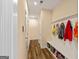 Inviting mudroom with bench, storage, and coat hooks, perfect for organization at 814 Parker Pass, Peachtree City, GA 30269