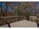 Wood deck presenting treetop views and a peaceful setting, creating an ideal outdoor retreat at 1491 Hada Ln, Lawrenceville, GA 30044