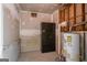 Unfinished basement with hot water heater and safe at 1491 Hada Ln, Lawrenceville, GA 30044