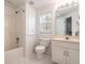A bathroom with a toilet, shower and vanity at 1491 Hada Ln, Lawrenceville, GA 30044