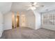 Open Primary bedroom with an ensuite bath and a window at 1491 Hada Ln, Lawrenceville, GA 30044