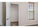 Bedroom featuring a window and a closet at 1491 Hada Ln, Lawrenceville, GA 30044