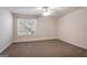 Bedroom with carpet and ceiling fan at 1491 Hada Ln, Lawrenceville, GA 30044