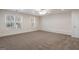 A bright bedroom with 2 windows and carpet at 1491 Hada Ln, Lawrenceville, GA 30044