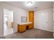 Bedroom showcasing a vanity with ample storage space and a well-lit interior at 1491 Hada Ln, Lawrenceville, GA 30044