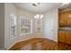 Breakfast nook with hardwood floors and natural light from the large windows at 1491 Hada Ln, Lawrenceville, GA 30044