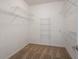 Walk-in closet with carpet and wire shelving at 1491 Hada Ln, Lawrenceville, GA 30044