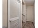 Hallway with closet with stairs at 1491 Hada Ln, Lawrenceville, GA 30044