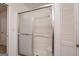 A close-up view of the bathroom shower featuring glass doors and a shower head at 1491 Hada Ln, Lawrenceville, GA 30044