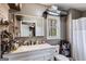 Modern bathroom with a large mirror, contemporary vanity, and stylish finishes at 327 Old Muse Rd, Carrollton, GA 30116