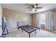 Bright bedroom featuring a bed frame, a large window, and natural light at 327 Old Muse Rd, Carrollton, GA 30116