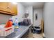 Functional laundry area featuring washer, dryer, and water heater at 327 Old Muse Rd, Carrollton, GA 30116
