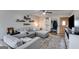Spacious living room with comfortable seating, view of entryway, and decor at 327 Old Muse Rd, Carrollton, GA 30116