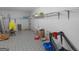 Unfinished basement featuring shelving, storage, and tile flooring at 1100 Parkside Ln, Mcdonough, GA 30253