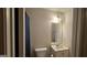 Neutral bathroom featuring a vanity with mirror, toilet, and shower at 255 Squire Ln, Fayetteville, GA 30214