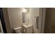 Neutral bathroom featuring a vanity with mirror and toilet at 255 Squire Ln, Fayetteville, GA 30214