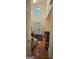 Bright foyer with a high ceiling, chandelier, and hardwood floors creating an open and welcoming entrance at 255 Squire Ln, Fayetteville, GA 30214