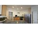 Functional kitchen featuring stainless steel appliances, light wood cabinets, and plenty of counter space at 255 Squire Ln, Fayetteville, GA 30214