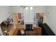 Bright living room boasting a fireplace, hardwood floors, and an open floor plan, perfect for entertaining at 255 Squire Ln, Fayetteville, GA 30214