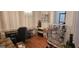 Comfortable office area with desk, birdcage, and natural light at 255 Squire Ln, Fayetteville, GA 30214