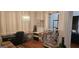 Relaxed living space with desk, chandelier, and decor at 255 Squire Ln, Fayetteville, GA 30214