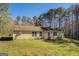 Expansive backyard with lush greenery and a peaceful setting at 178 Norman Rd, Covington, GA 30014