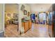 Open-concept layout with dining area and living room featuring hardwood floors and natural light at 178 Norman Rd, Covington, GA 30014