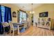 Charming dining room with a farmhouse-style table, and lovely natural light, ideal for Gathering meals at 178 Norman Rd, Covington, GA 30014