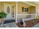 Charming front porch with decorative door and seasonal decorations at 178 Norman Rd, Covington, GA 30014