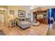 Cozy living room featuring a comfortable sofa, stylish decor, and a large entertainment center at 178 Norman Rd, Covington, GA 30014