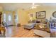 Bright and open living room with hardwood floors, stylish decor, and a welcoming entrance at 178 Norman Rd, Covington, GA 30014