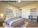 Virtually staged bedroom features a plush rug, bed, night stands, and stylish decor at 6268 Mount Zion Blvd, Morrow, GA 30260