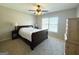 Relaxing bedroom features a large window and a comfortable bed with a decorative quilt at 1441 Henderson Ridge Ln, Loganville, GA 30052