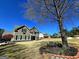 Traditional two-story home on a well-maintained lot with mature trees and landscaping at 1441 Henderson Ridge Ln, Loganville, GA 30052