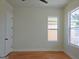 Neutral bedroom featuring hardwood floors, closet, and a bright window at 721 Cascade Sw Ave, Atlanta, GA 30310