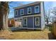 Back exterior shows blue siding, large windows, and porch for enjoying a private, serene yard at 721 Cascade Sw Ave, Atlanta, GA 30310